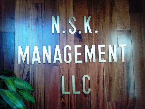 NSK-Mgmt-interior-bronze-letters